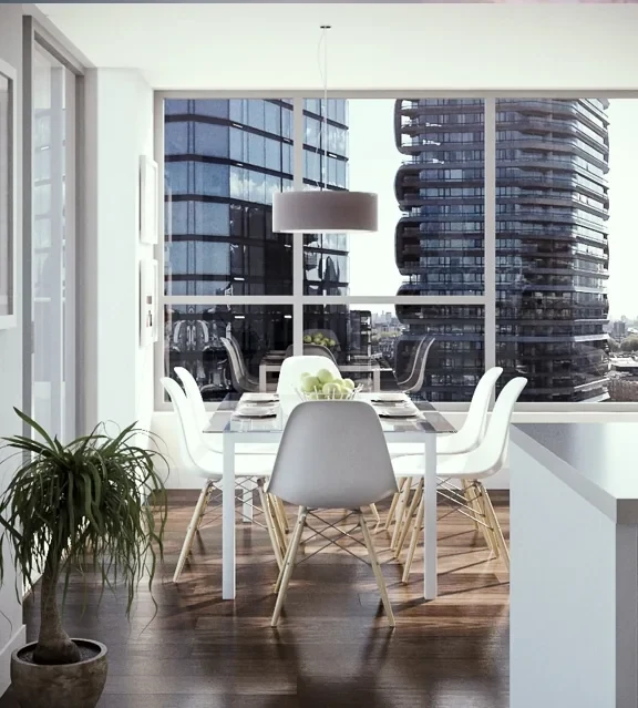 Bright dining space with full-height glazing, white chairs and timber flooring